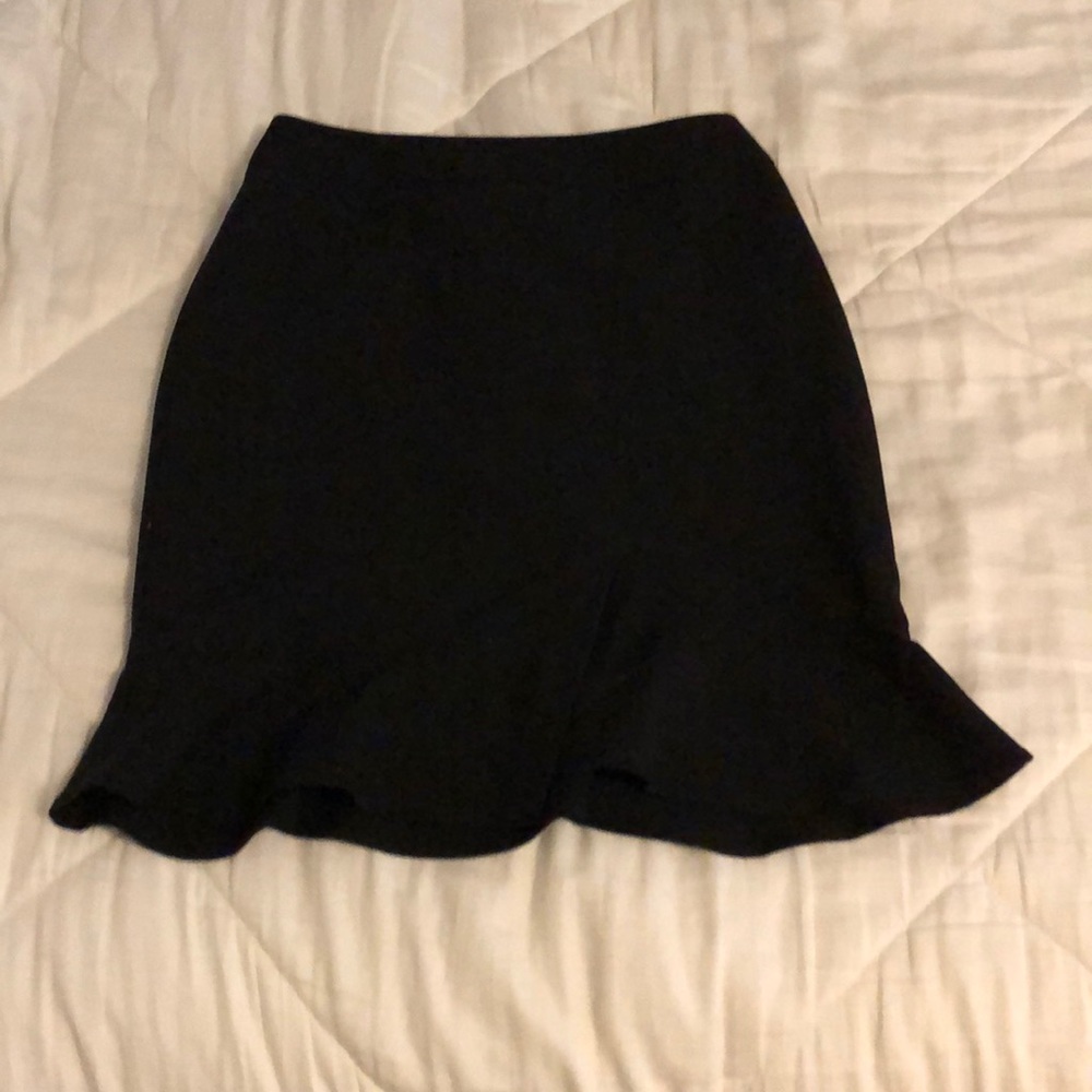 black pencil trumpet skirt